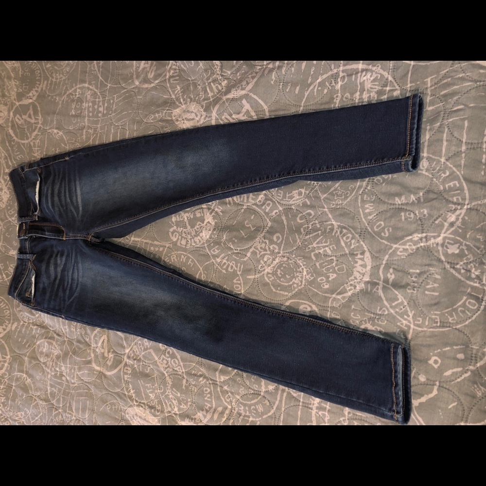 high-rise ankle dark blue jeans